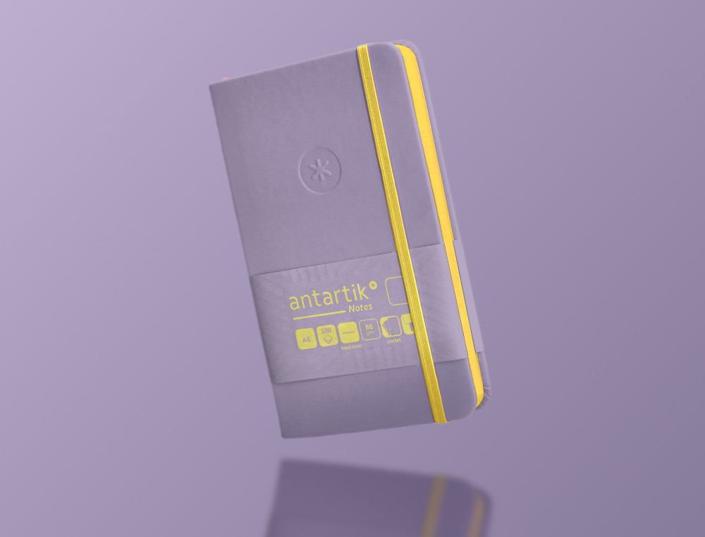 CARNET FERMETURE ELASTIQUE JAUNE ANTARTIK NOTES COUVERTURE RIGIDE A6 PAPIER UNI IVOIRE 100 FEUILLES 80GR FSC LILAS